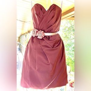 David’s Bridal short strapless pleated satin dress in a mauve, plus sash